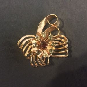Vintage brooch with red and clear stones gold